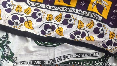 Two kangas imprinted with Swahili proverbs (Rukia Hassan)
