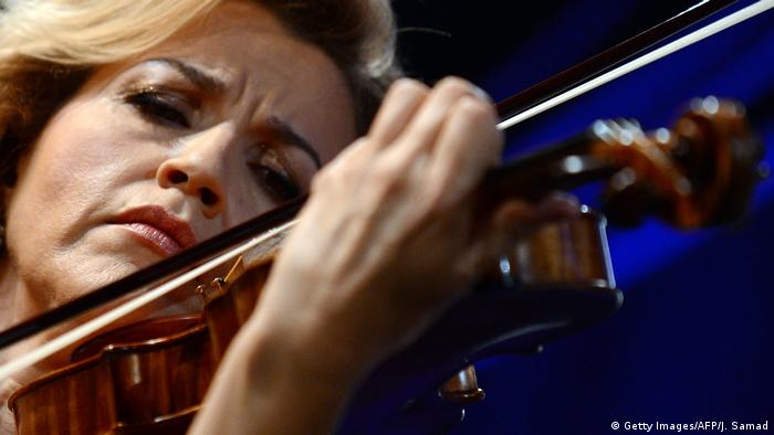 close-up of a woman playing the violin 