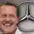 Michael Schumacher und Mercedes-Stern (Foto: AP/DW Montage)