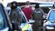 Suspect Stephan E. accompanied by police Suspect Stephan E. accompanied by police