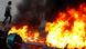 A barricade set on fire by anti-government protesters is pictured during a demonstration in Sha Tin A barricade set on fire by anti-government protesters is pictured during a demonstration in Sha Tin