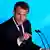 Emmanuel Macron za govorničkim pultom
