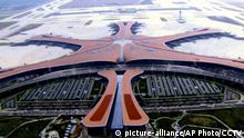 17.09.2019
In this image made from CCTV video taken Sept. 17, 2019, an aerial view is seen of the new Beijing Daxing International Airport. The Chinese capital, Beijing, has opened a second international airport with a terminal billed as the world’s biggest. (CCTV via AP) |