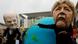 Angela Merkel and Olaf Scholz portrayed at Fridays for Future protest Angela Merkel and Olaf Scholz portrayed at Fridays for Future protest
