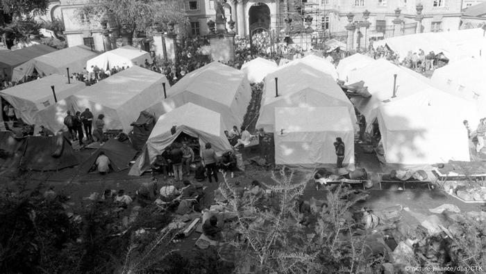 Refugees from East Germany camping outside the West German Embassy in 1989