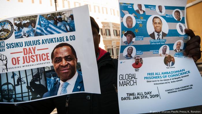 Placards with Ambazonia prisoners