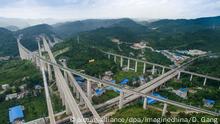 --FILE--A view of high-speed railways in Wudang district in Guiyang city, southwest China's Guizhou province, 21 June 2016. Guiyang, the capital of China's poor-but-fast-growing Guizhou province, edged out financial capital Shanghai as the nation's top performer, a ranking by the Milken Institute shows. Despite being in the less-developed southwest, Guiyang catapulted from No.11 in 2015's inaugural ranking and leapfrogged bigger, wealthier coastal megacities. The city of 4.6 million is benefiting from a central government push to connect coastal and inland regions and infrastructure investment related to President Xi Jinping's One Belt, One Road initiative to revive China's ancient trade links to Asia and Europe, according to a report released Monday (12 September 2016) by the Santa Monica, California-based think tank founded by Michael Milken |