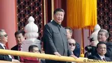 Chinese President Xi Jinping stands near former Chinese presidents Hu Jintao, Jiang Zemin and Premier Li Keqiang on Tiananmen Gate during the military parade marking the 70th founding anniversary of People's Republic of China, on its National Day in Beijing, China October 1, 2019. REUTERS/Jason Lee