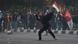 An Indonesian student protester throws stones in Jakarta An Indonesian student protester throws stones in Jakarta