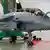 A French Rafale fighter jet in a hanger