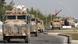 Turkish military vehicles in a border town near Syria Turkish military vehicles in a border town near Syria