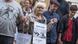 Irmela Mensah-Schramm with "Away with Nazis!" sign Irmela Mensah-Schramm with "Away with Nazis!" sign