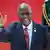 John Magufuli waves during an event in South Africa