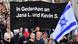 People march in an memorial for victims of the Halle synagogue attack, holding up a banner and an Israeli flag People march in an memorial for victims of the Halle synagogue attack, holding up a banner and an Israeli flag