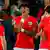 England's Tyrone Mings and teammates stand during a break in play