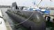 A Type 214 submarine docked at a port A Type 214 submarine docked at a port