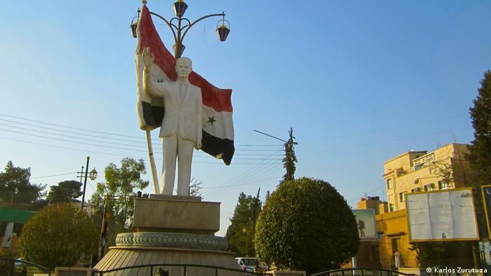 A statue of Hafez Assad presides in Qamishli 