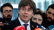 Former Catalan leader Carles Puigdemont talks to the media as he leaves free a prosecutor office at the Justice Palace after handing himself to police in Brussels, Belgium October 18, 2019. REUTERS/Francois Lenoir