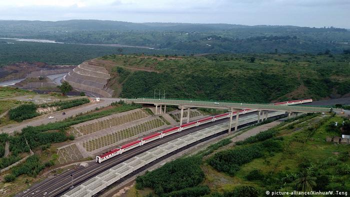 Kenya SGR train passes under a bridge 