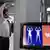 Man being scanned in a full-body scanner