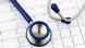 A stethoscope and chart A stethoscope and chart
