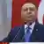 Turkish President Recep Tayyip Erdogan holds a speech