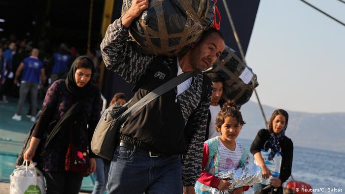 Refugees arrive at the port in Athens, Greece