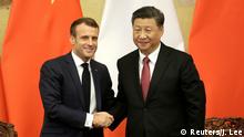 French President Emmanuel Macron shakes hands with China's President Xi Jinping after a joint news conference at the Great Hall of the People in Beijing, China November 6, 2019. REUTERS/Jason Lee/POOL