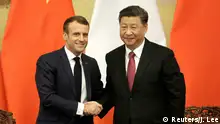 French President Emmanuel Macron shakes hands with China's President Xi Jinping after a joint news conference at the Great Hall of the People in Beijing, China November 6, 2019. REUTERS/Jason Lee/POOL