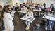 Pupils sit at desks in a small classroom in Italy Pupils sit at desks in a small classroom in Italy