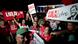 Brasilian protesters hold up signs with Lula written on them Brasilian protesters hold up signs with Lula written on them