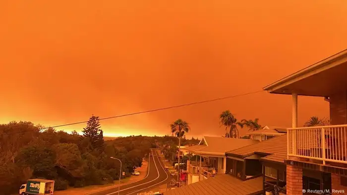 Bushfires turn the sky orange in Port Macquarie. 