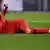 Kai Havertz signals to the physio for attention