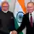 Russian President Vladimir Putin (R) and Indian Prime Minister Narendra Modi shake hands during their meeting on the sidelines of the 11th edition of the BRICS Summit