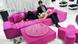 A bright pink couch at the Cologne furniture fair A bright pink couch at the Cologne furniture fair