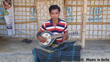 Rohingya refugee Din Islam plays his mandolin at a refugee camp in Bangladesh. His music was recorded in 2018 as part of Music in Exile, a project to document the culture of displaced peoples (Credit: Music in Exile)