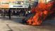 Protesters stand around a burning motorcycle in Isfahan Protesters stand around a burning motorcycle in Isfahan