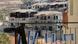 Israeli flags fly in front of new Jewish housing in the Efrat Settlement, West Bank Israeli flags fly in front of new Jewish housing in the Efrat Settlement, West Bank