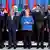 Merkel standing along with African leaders