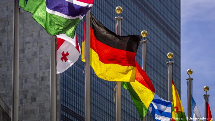 Flags, including that of Germany, in front of the UN headquarters in New York
