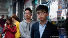 24.11.2019 *** Disqualified candidate and pro-democracy activist Joshua Wong stands in line to vote in the district council elections in Hong Kong, China November 24, 2019. REUTERS/Laurel Chor TPX IMAGES OF THE DAY