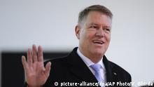 Romanian President Klaus Iohannis waves after casting his vote in Bucharest, Romania, Sunday, Nov. 24, 2019. Romanians are voting in a presidential runoff election in which incumbent Klaus Iohannis is vying for a second term, facing Social Democratic Party leader Viorica Dancila, a former prime minister, in Sunday's vote. (AP Photo/Vadim Ghirda) |
