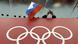 A Russian flag held near a sign featuring the Olympic Rings (AP Photo/David J. Phillip, File) A Russian flag held near a sign featuring the Olympic Rings (AP Photo/David J. Phillip, File)