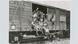 In this photo from May 1945, former forced laborers from France sit on a train car in Braunschweig, Germany — awaiting repatriation to France after the Allied liberation In this photo from May 1945, former forced laborers from France sit on a train car in Braunschweig, Germany — awaiting repatriation to France after the Allied liberation