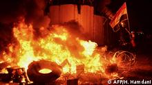 متظاهرون يضرمون النار في مبنى القنصلية الإيرانية في النجف