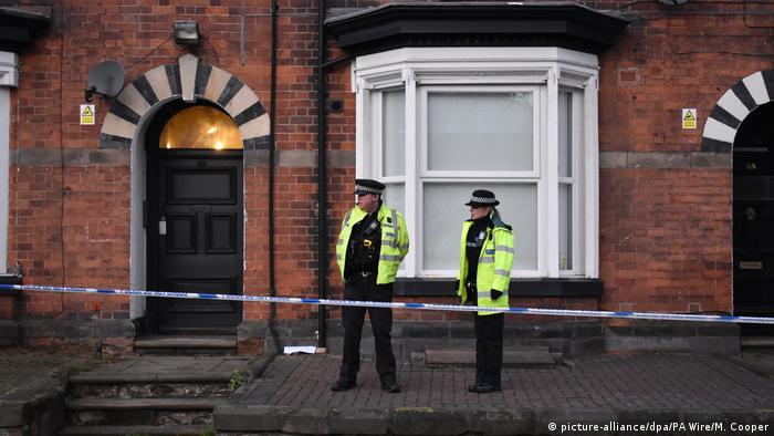 Police stand outside a house in Staffordshire where they were conducting a search following a knife attack on the London Bridge