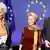 رئيسة المفوضية الأوروبية أورزولا فون دير لاين (وسط) إلى جانب رئيس المجلس الأوروبي شارل ميشال (يمين) ورئيسة البنك المركزي الأوروبي كريستين لاغارد (يسار).