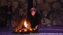 German Chancellor Angela Merkel lays a wreath in the Hall of Remembrance in the Yad Vashem Holocaust Museum in Jerusalem, October 4, 2018. Photo by Debbie Hill/UPI Photo via Newscom picture alliance |