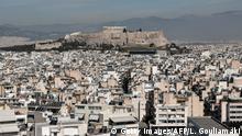 A view of the Neos Kosmos and the Koukaki areas in Athens, beneath the Acropolis, which in 2016 was named Airbnb's fifth fastest growing neighbourhood globally with an 800-percent jump in home-sharing. - The Greek chamber of hotels commissioned a Grant Thornton study that found that over 76,000 properties in Greece are available on home-sharing platforms. The study argued that declining availability had pushed up rents in central Athens by 9.3 percent in a year, disproportionately affecting poorer sections such as pensioners and single-parent families. (Photo by LOUISA GOULIAMAKI / AFP) (Photo credit should read LOUISA GOULIAMAKI/AFP via Getty Images)