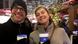 Couple at Christmas market drinking mulled wine